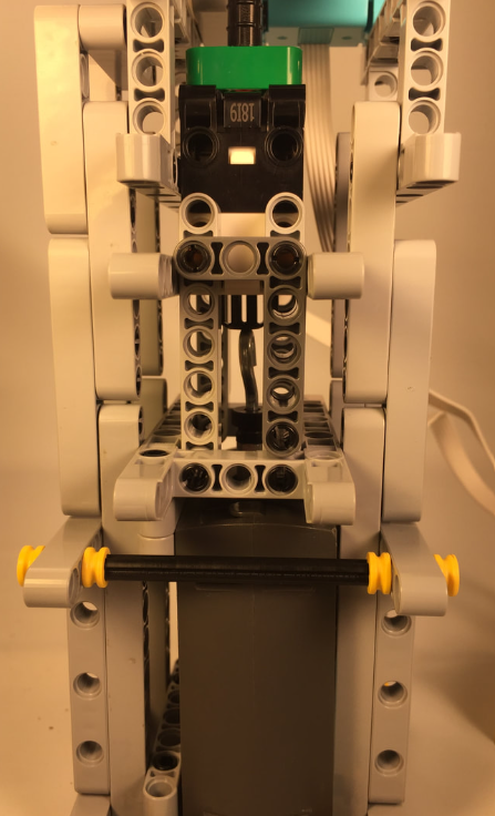 SPIKE touch sensor calibration robot, base close-up
