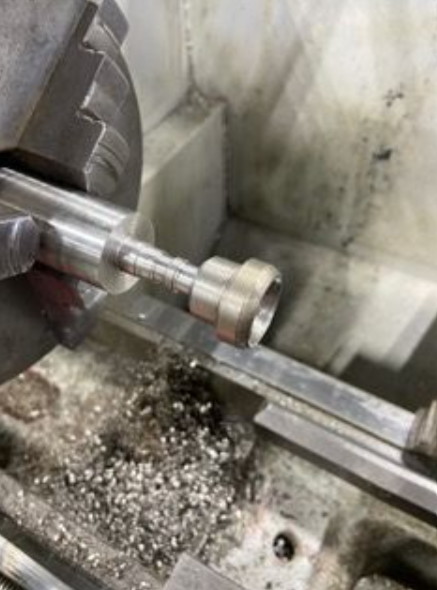 Hand-turning the mouthpiece on the lathe